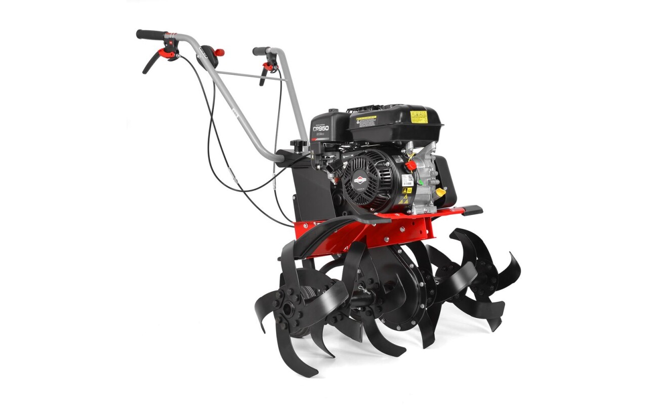 Petrol powered tiller equipped with Briggs & Stratton CR 950 engine. Working width 32/50/84 cm