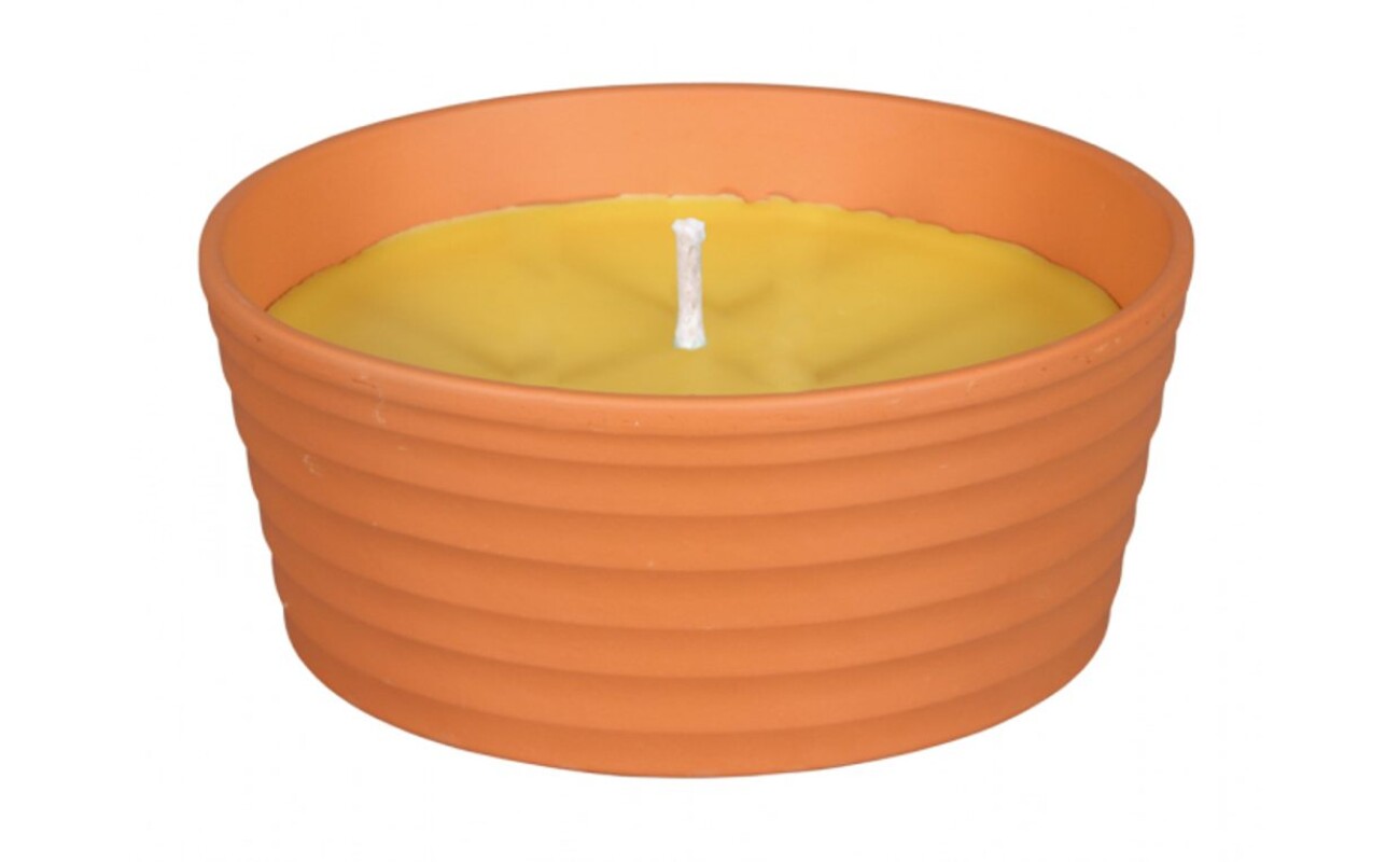 Scented candle in a terracotta planter. Dia. 13 x 6 cm