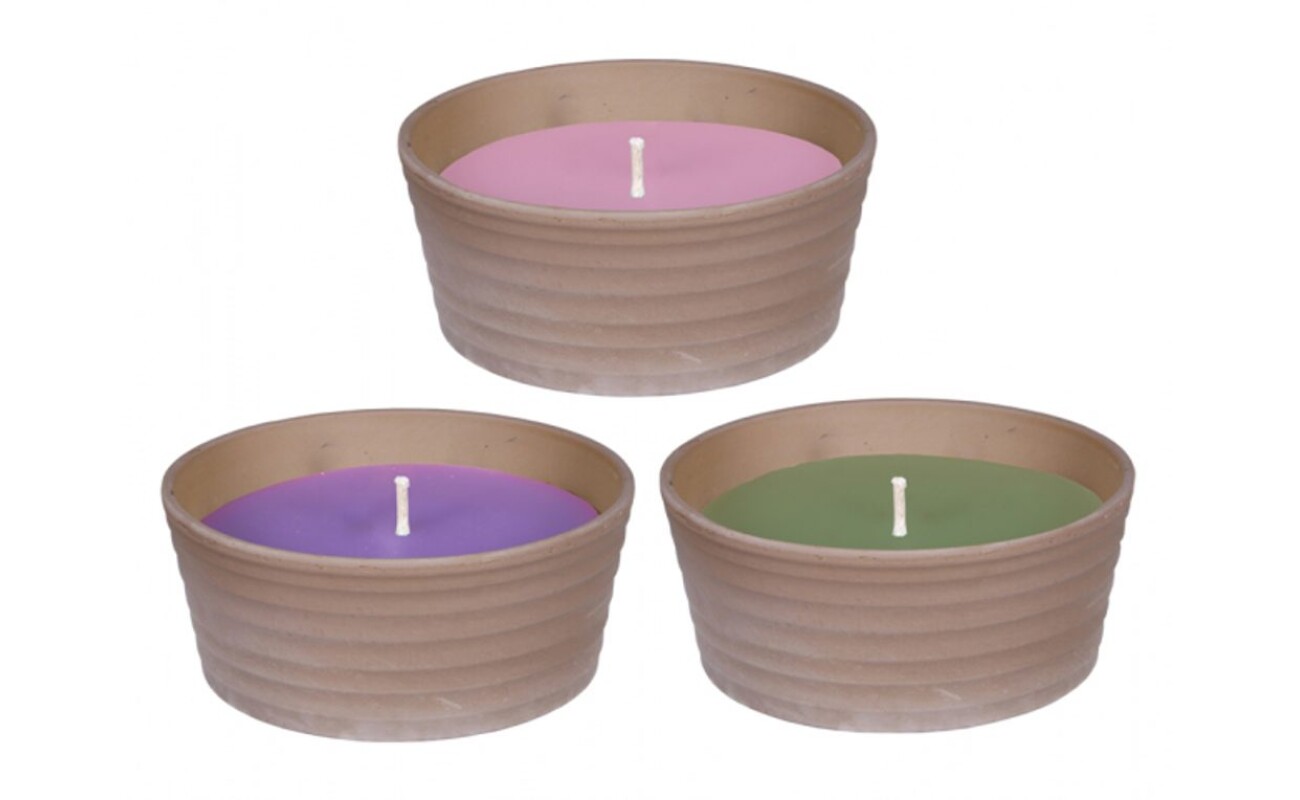 Scented candle in a terracotta planter. Dia. 13 x 6 cm